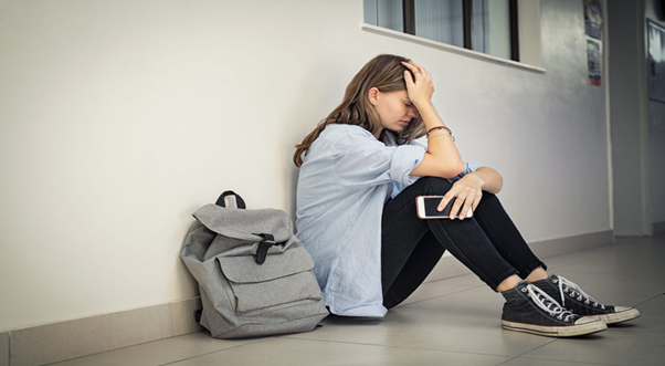A person sitting on the floor
Description automatically generated with low confidence
