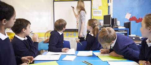 A Classroom with a teacher and children