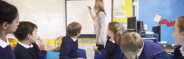 A group of people in a room
Description automatically generated