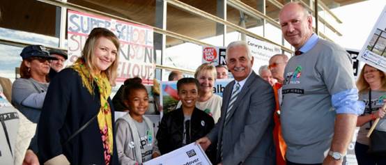Petitioners handing over the petition to the Assembly